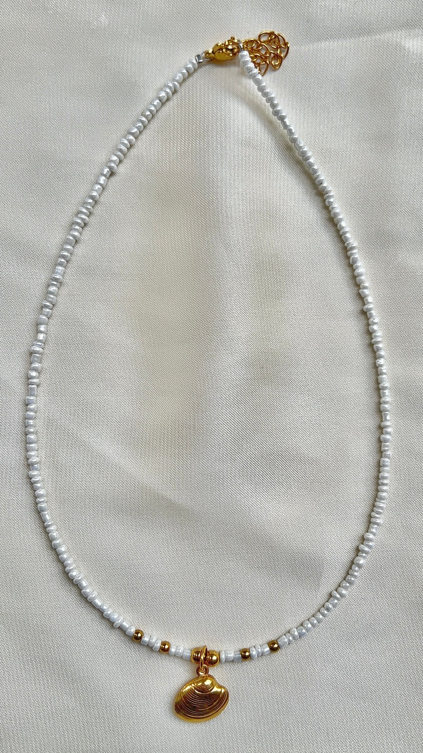 shell necklace with white beads