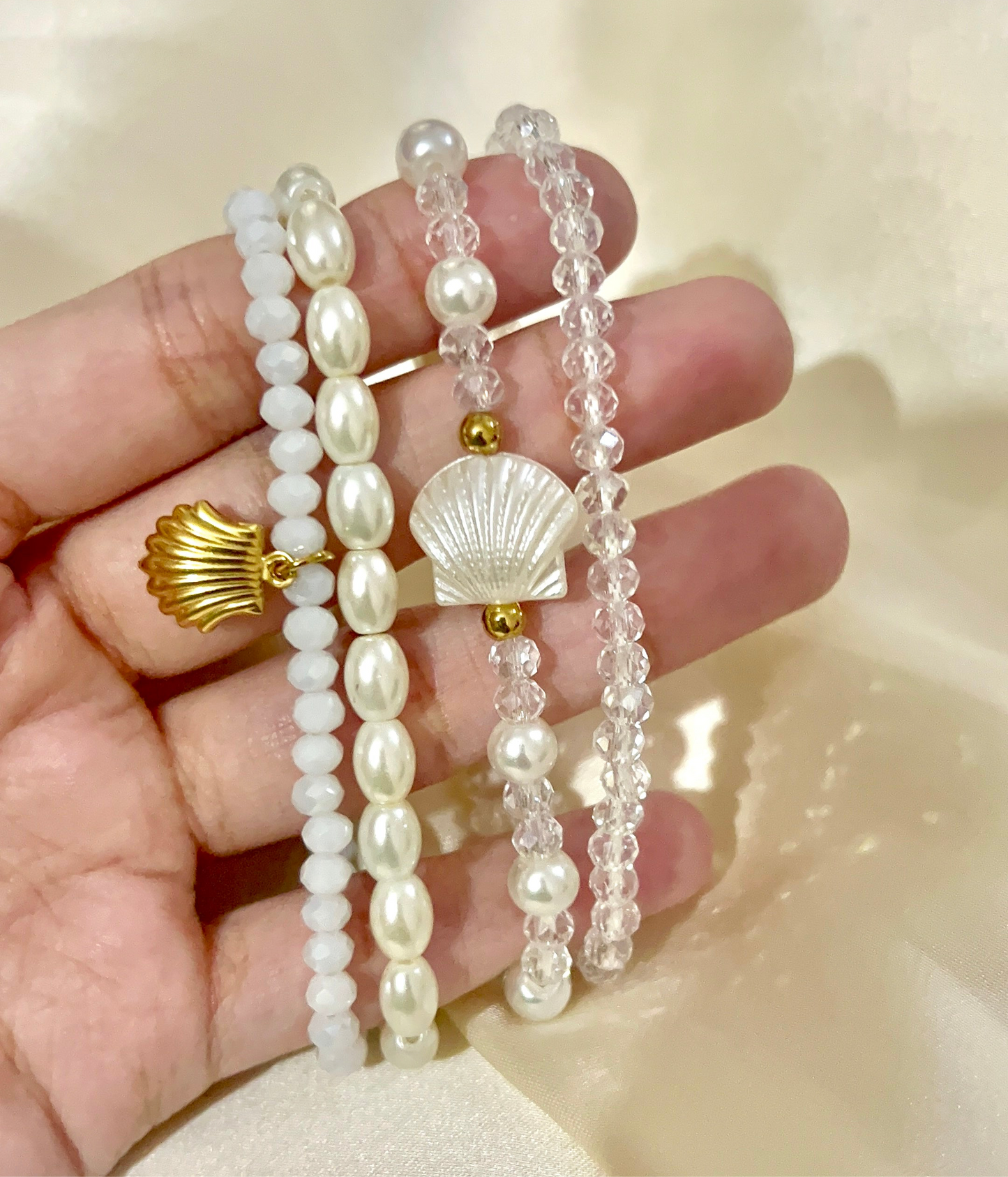 white bracelet stack in elastic