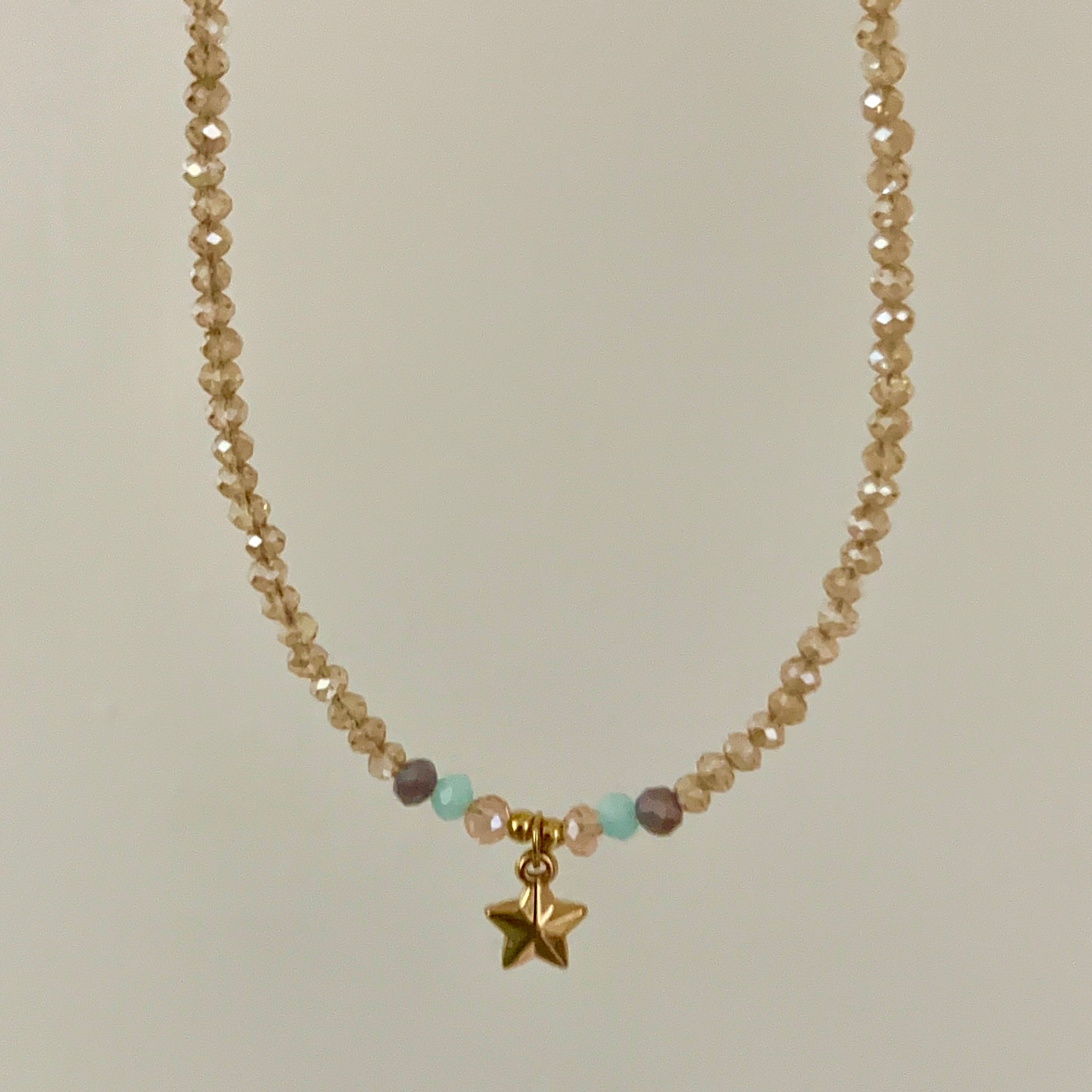 gold star charm necklace
