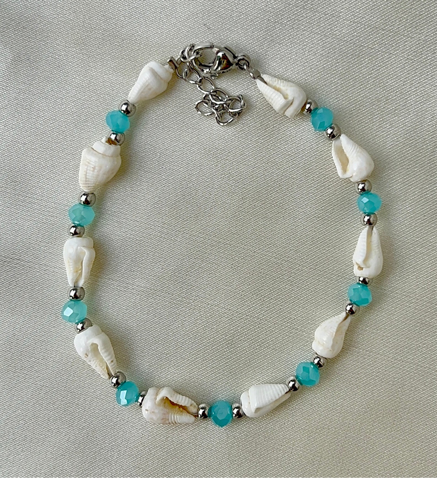 shell bracelet with blue accents