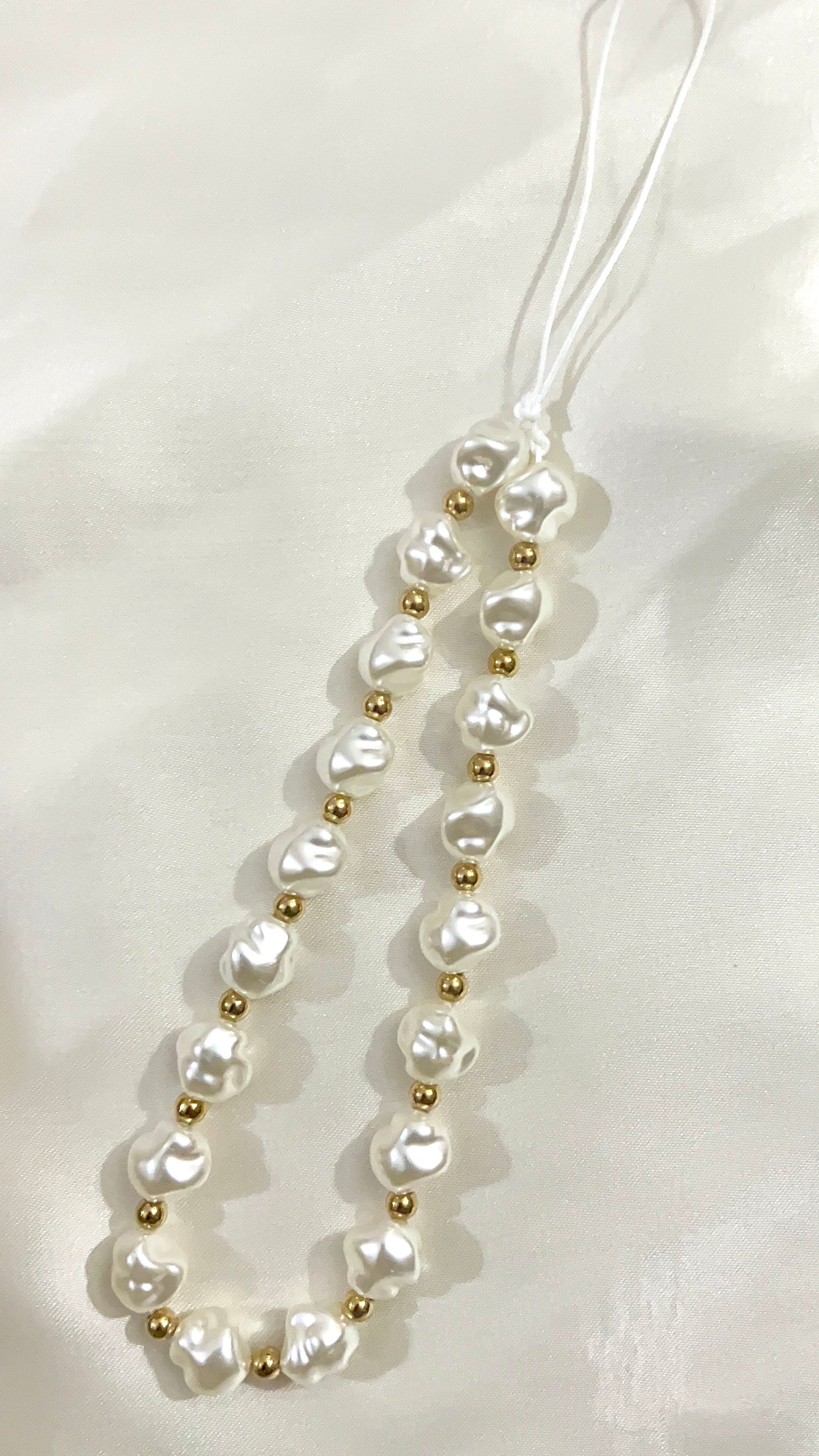 pearl and gold phone charm