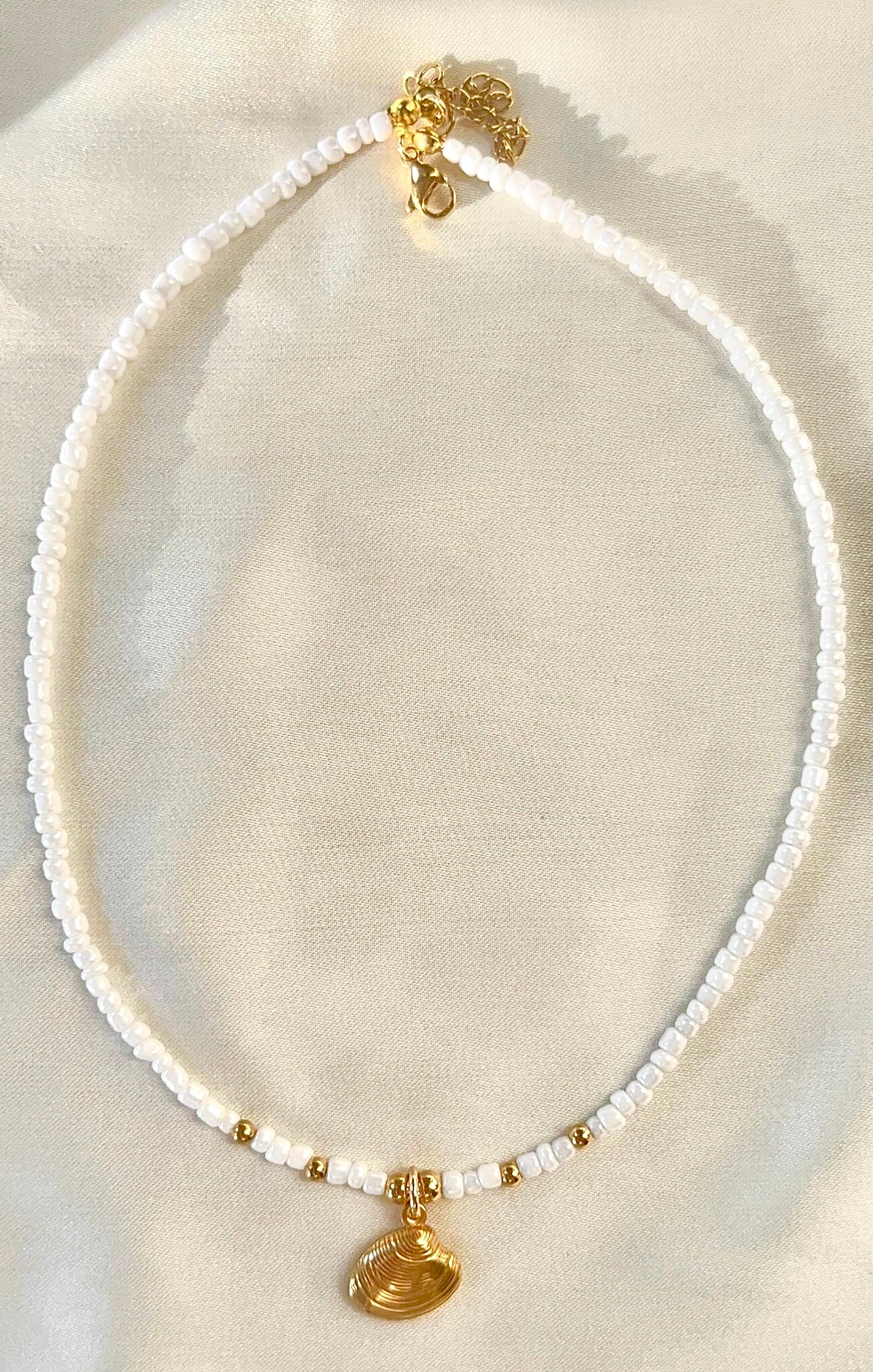 shell necklace with white beads