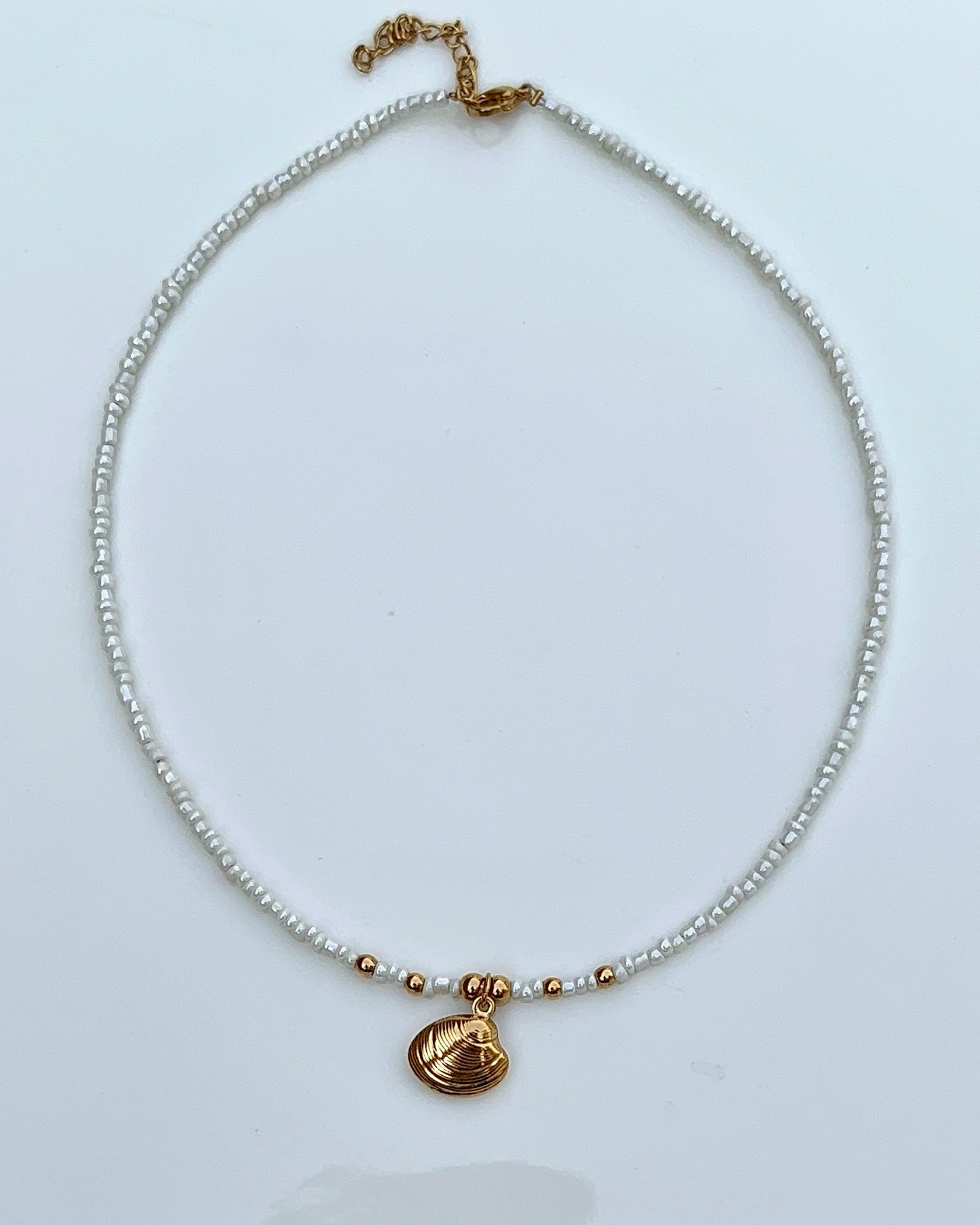 shell necklace with white beads