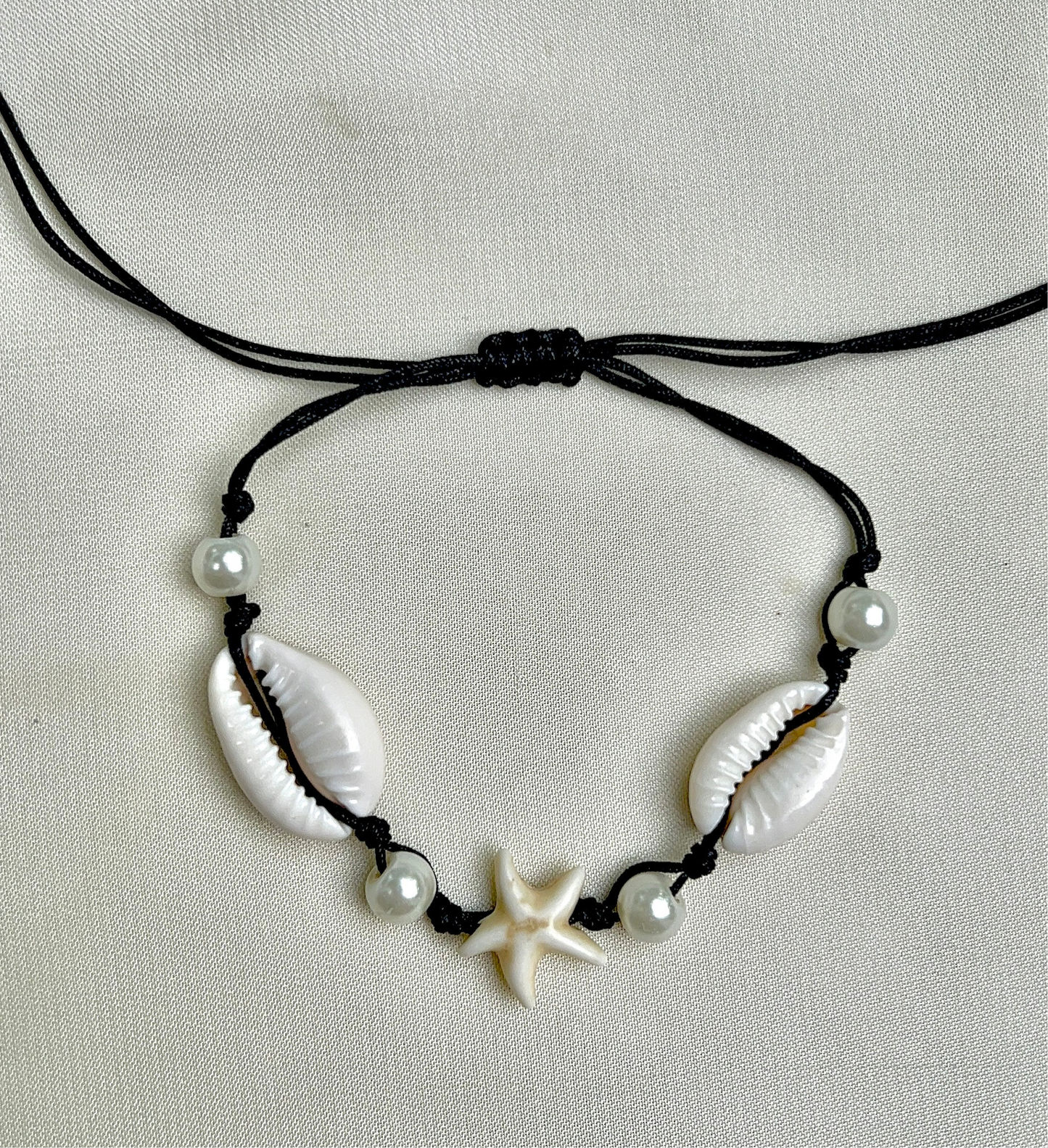 thread bracelet shell beach