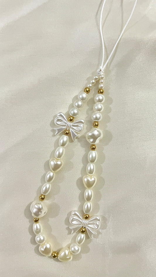 pearl and bow phone charm