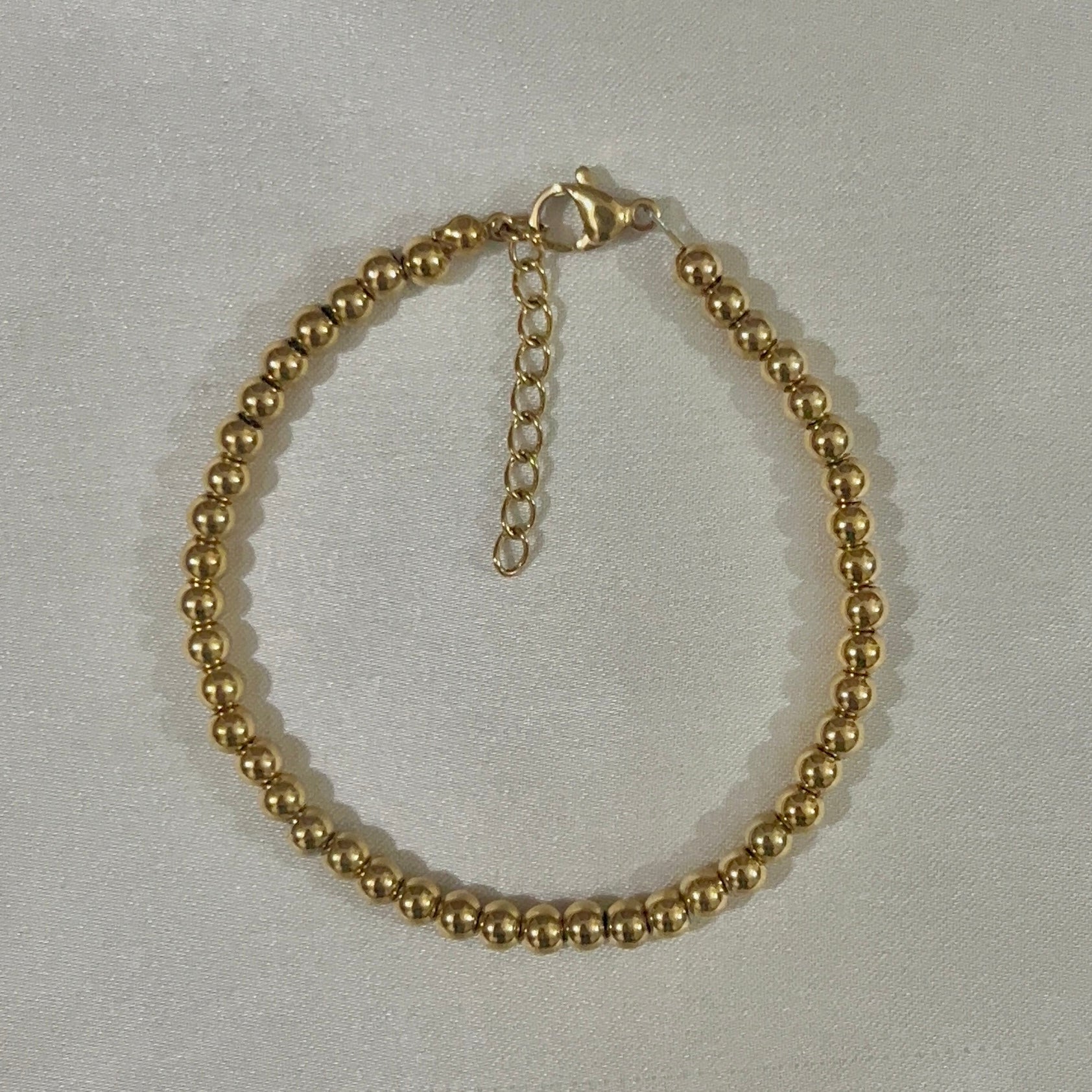 gold beaded bracelet