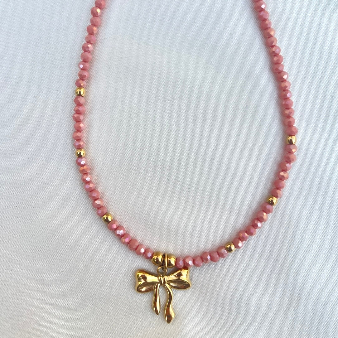 peach bow necklace