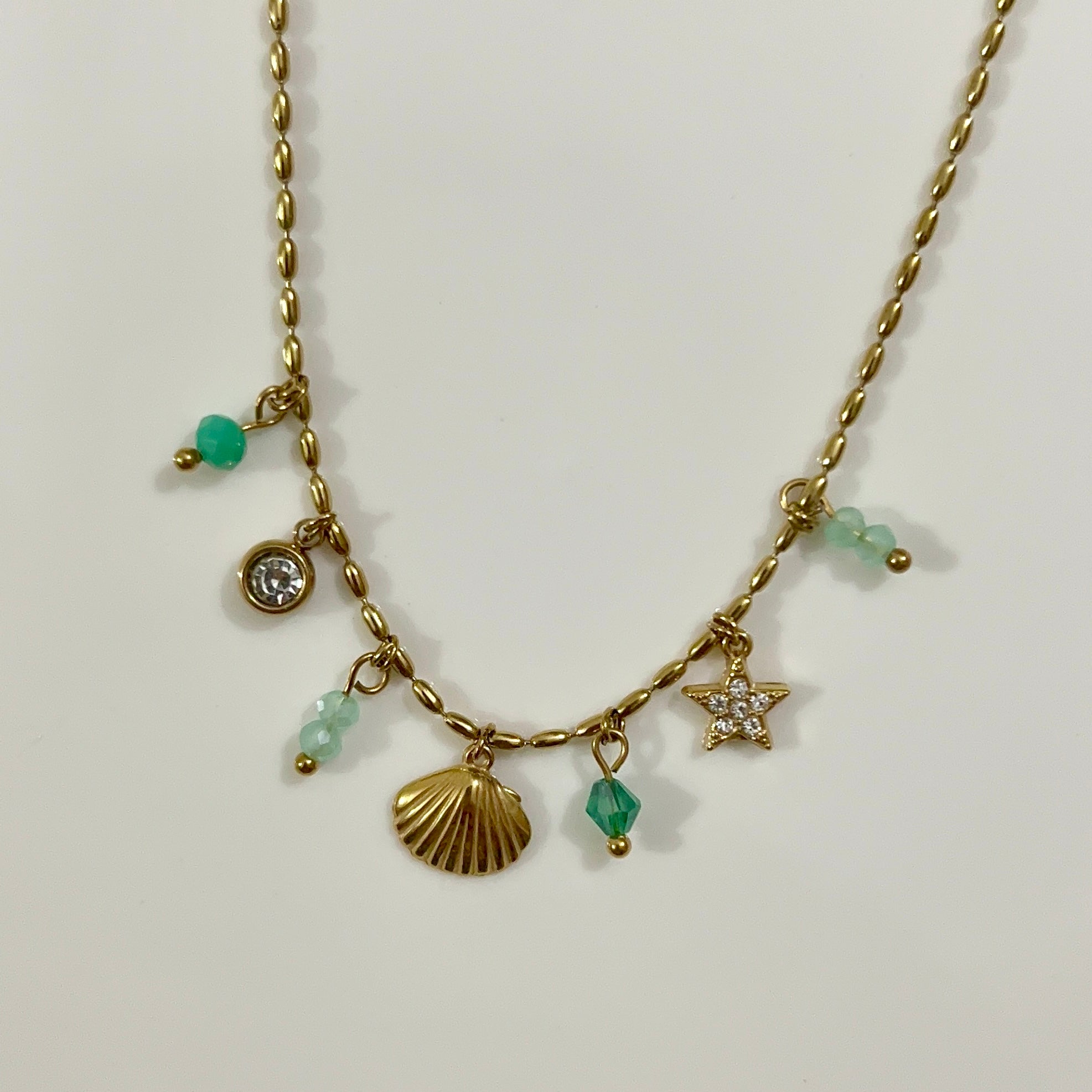teal charm necklace